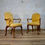 Thumbnail: A Pair Of Yellow Upholstered George I Style Shepherd Crook Armchairs