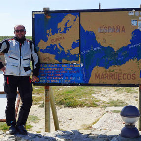 How much does it cost to ride around the world on a motorcycle?