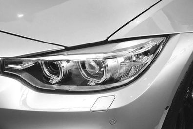 Silver Car getting automotive services by Simply Structured