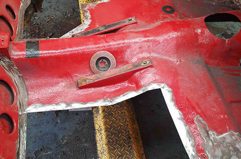 Red car floor restoration in progress
