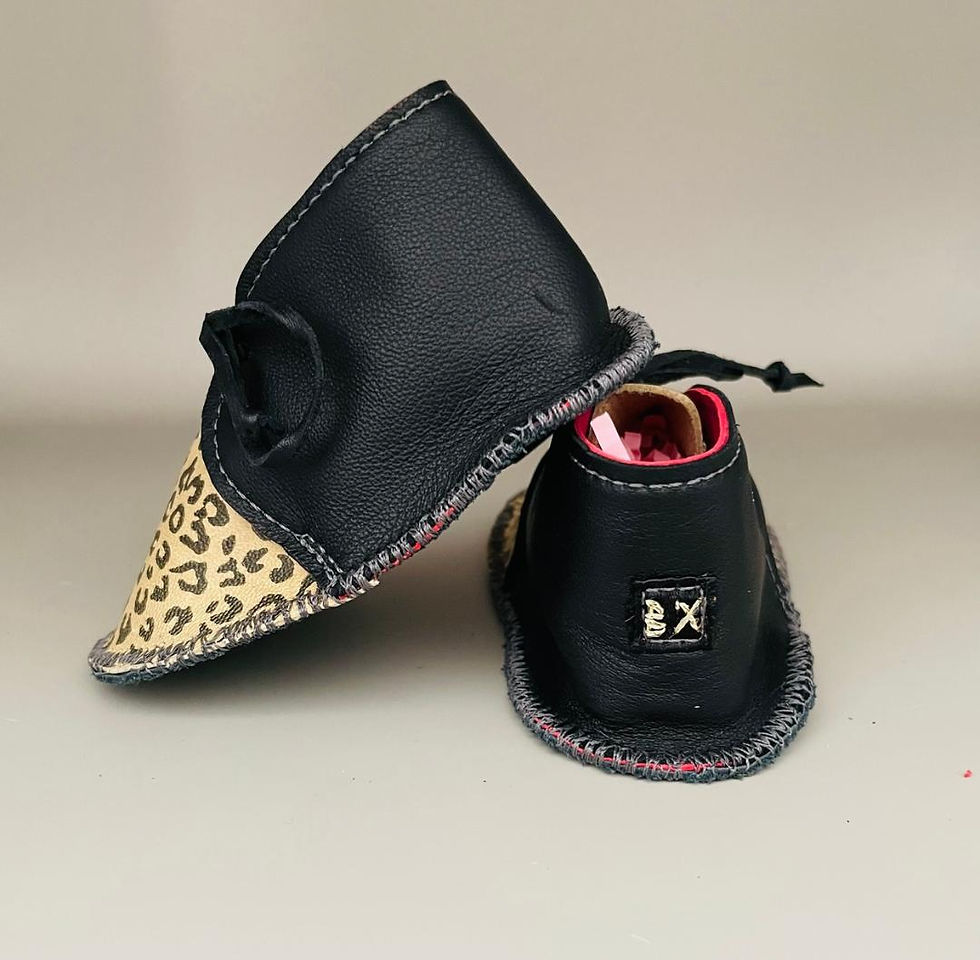 Thumbnail: Black and gold leopard buddy boot