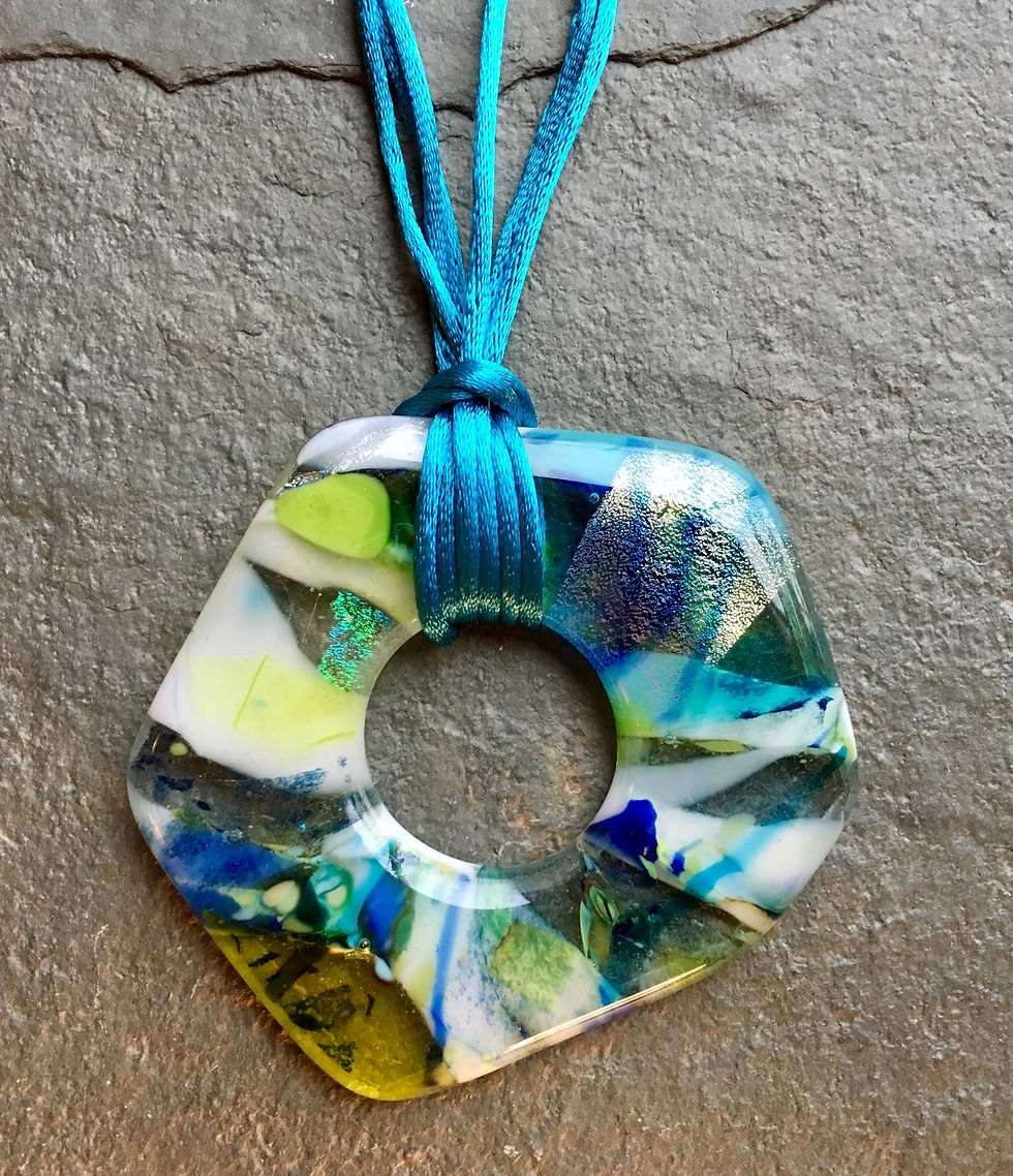 Advanced Fused Glass donut pendant made by Nancy from her own handmade glass sheets at Rainbow Glass Studios