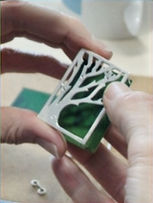 La Gomera brooch,under construction, featuring silver, diamonds, anodised aluminium and worn as a brooch or a pendant, made by Eleanor J Watson