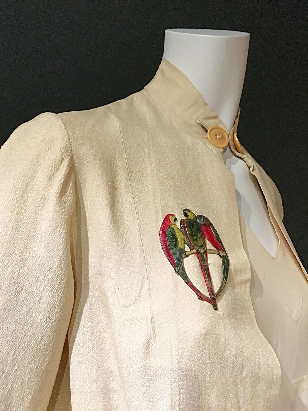1920's silk blouson jacket with enamelled parrot brooch