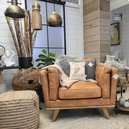 Wrapped in premium, faux cognac brown leather and offering unparalleled comfort, guaranteed to have you lounging for hours.
