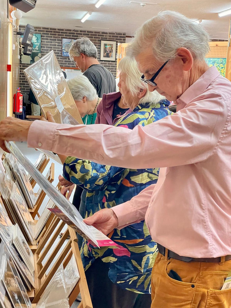 People looking at artwork