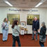Mr Bill Tremett with a display stand of antique pharmacy objects