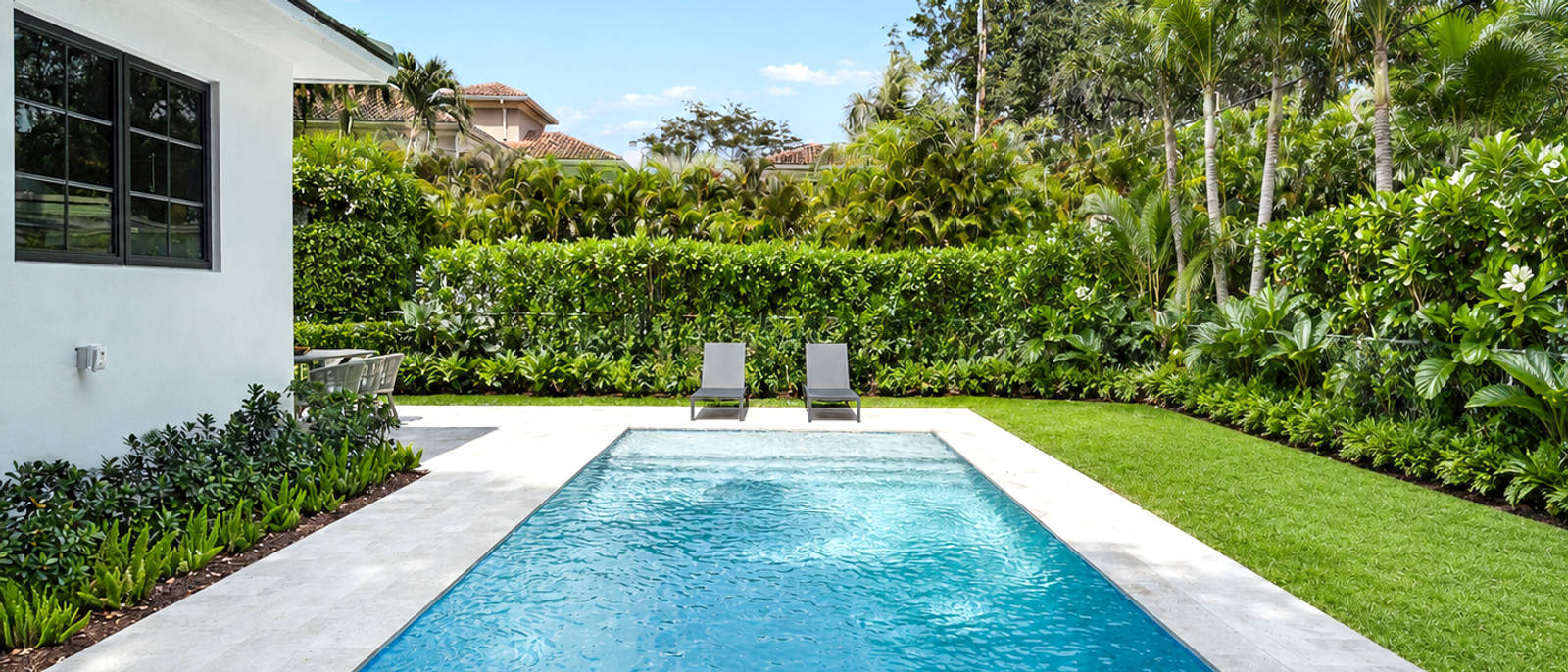 Sevilla — pool and landscaped rear yard