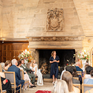 Waterford Castle wedding ceremony by the fire place 