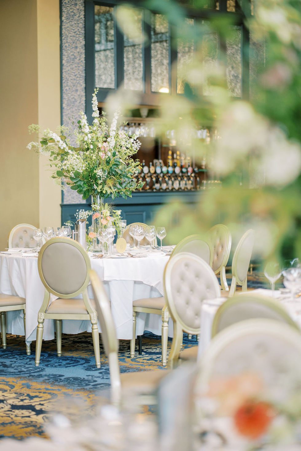 a table with a vase of flowers on it