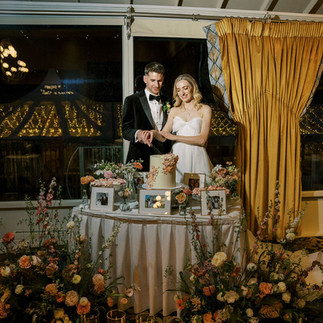 Faithlegg House Hotel bride and groom cutting the cake 
