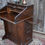 Thumbnail: Antique Edwardian Harris Lebus Oak Tambour Roll Top Desk Bank of Drawers Bureau