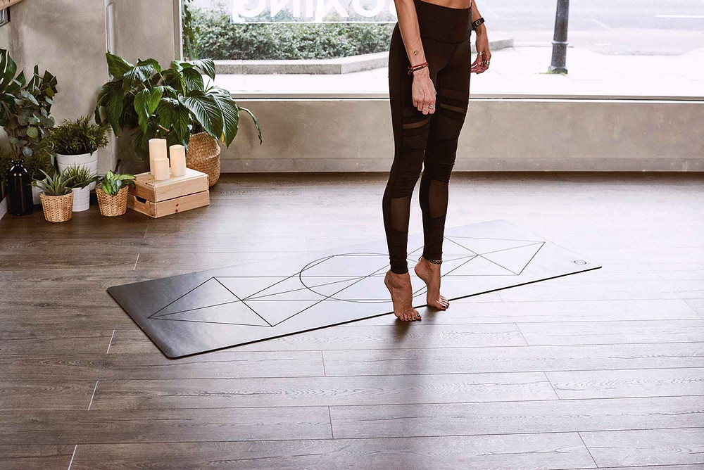 woman tip toeing on floor