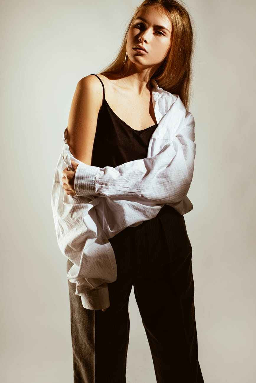 photo of woman wearing white long sleeves