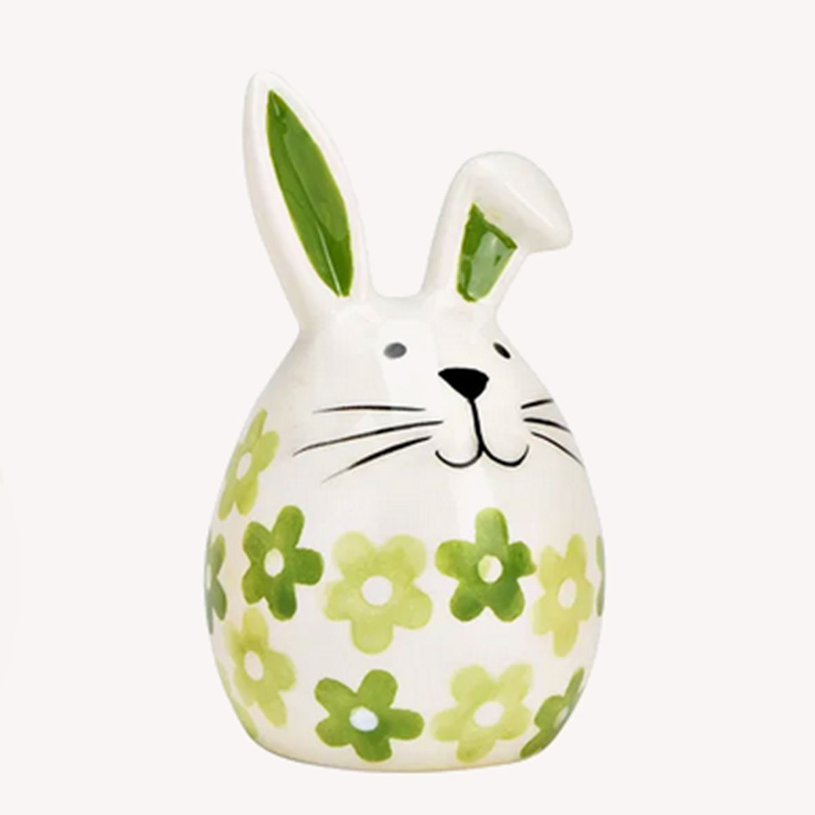 Keramik-Hase als Osterdeko mit grünen Blumenmustern