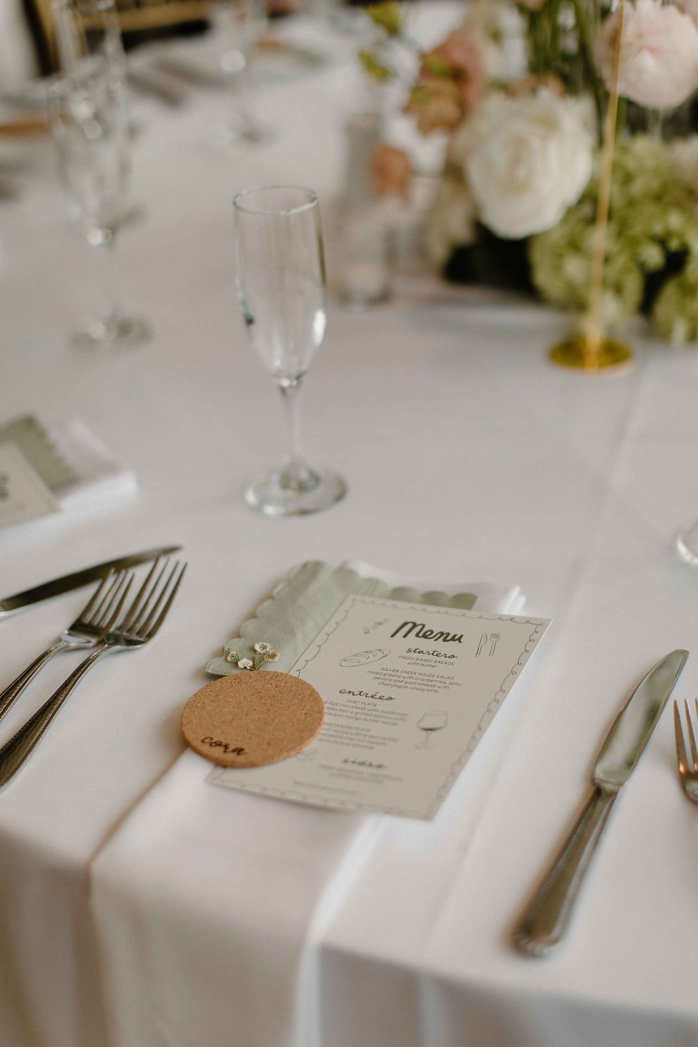 table setting at wedding with personalized coaster