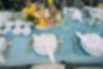 place setting featuring Chinese soup bowls and family style dinner.