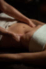 girl-enjoying-therapeutic-massage-with-oil-spa-with-dark-lighting-closeup.jpg