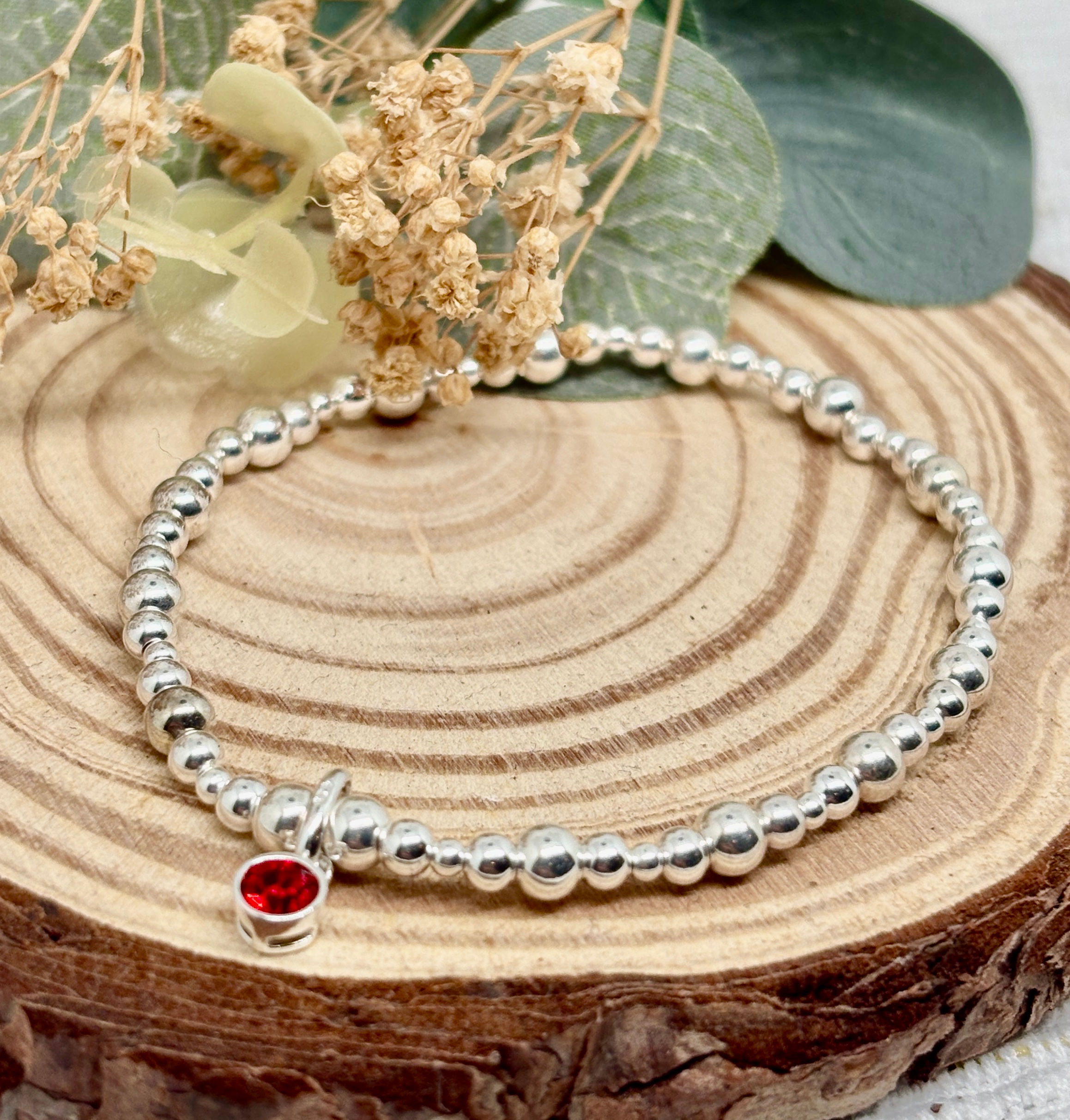 Ruby Bezel Charm Stretch Bracelet - 925 Sterling Silver