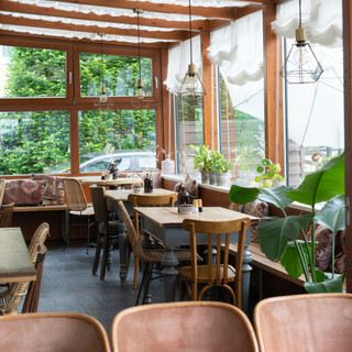 Wintergarten mit Sitzgelegenheit
