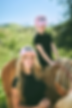 mother and daughter with horse