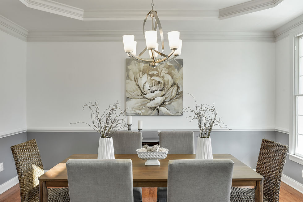 Eye-level view of a bright and neatly arranged living room with neutral decor