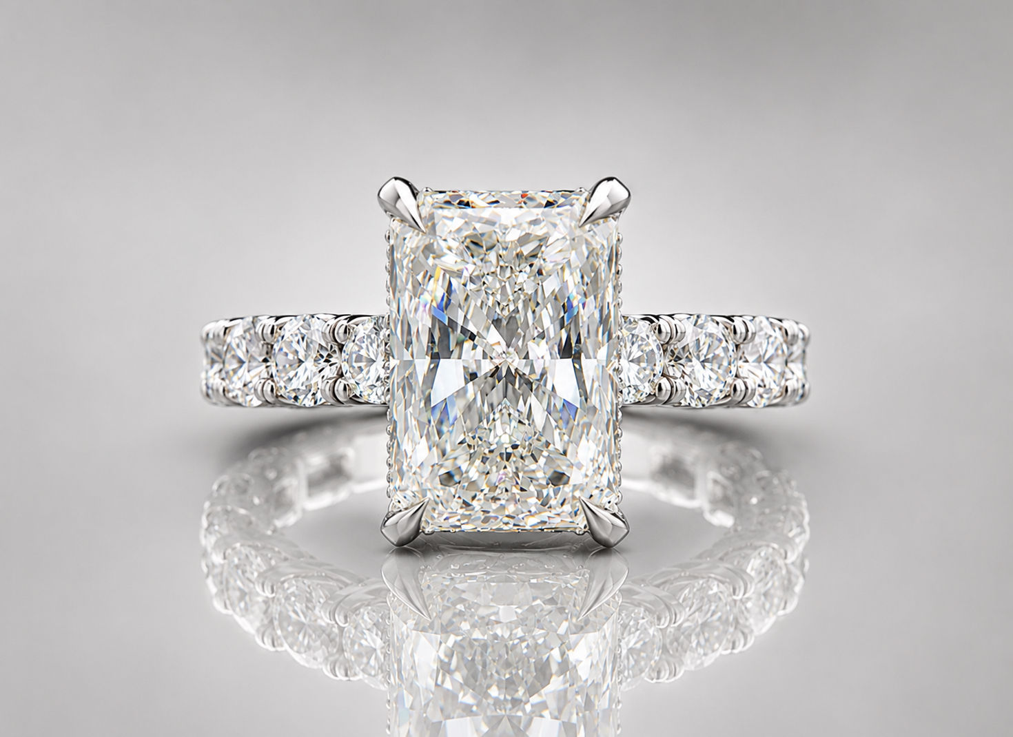 8.5 carat Radiant cut Diamond Ring with Round Side Stones