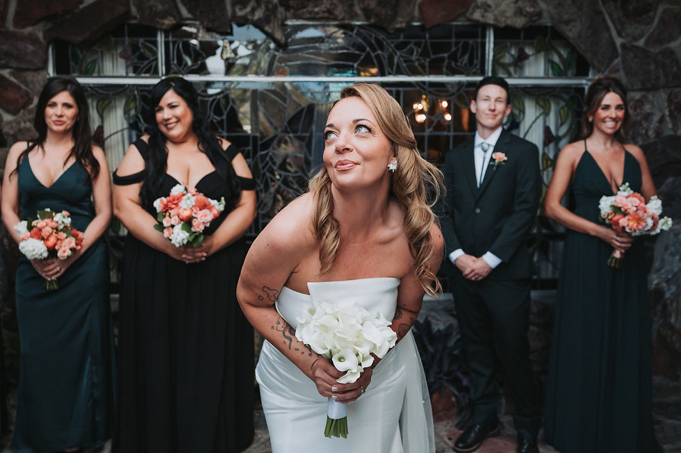 Bride with bridesmaids at Madonna Inn