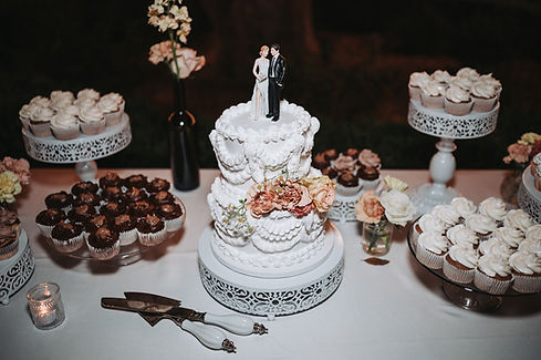 Wedding Cake With Desert Table