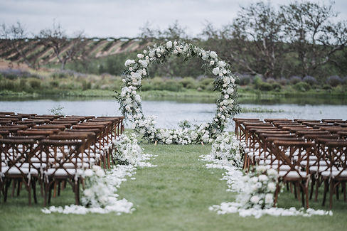 Wedding Arch covered in flowers at La Lomita Ranch in San Luis Obispo California.