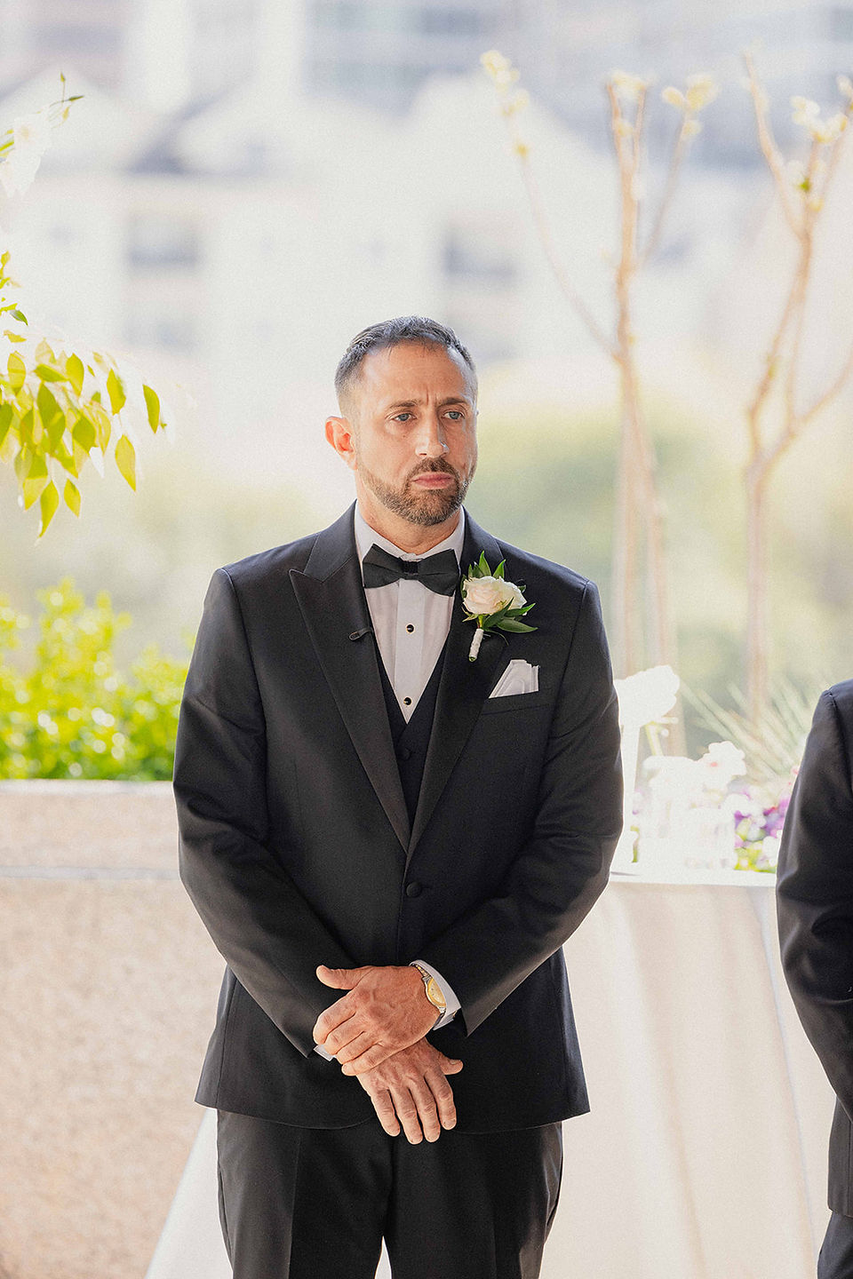 Luxury Four Seasons Hotel Atlanta wedding featuring a rooftop ceremony overlooking the Midtown Atlanta skyline, timeless bride and groom portraits, elegant reception details with candlelit décor and a champagne tower, heartfelt family moments, and classic luxury wedding photography.
