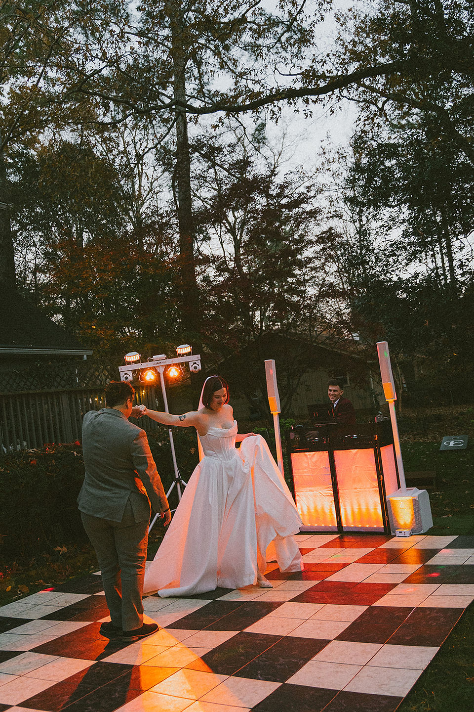 Intimate ,WLW, backyard wedding ,Atlanta, emotional moments, relaxed atmosphere, blend, editorial portraits , documentary-style, storytelling.Two brides ,celebrating ,intimate backyard wedding, candid moments, timeless ,editorial photography, cinematic lighting, editorial portraits, authentic documentary-style moments
