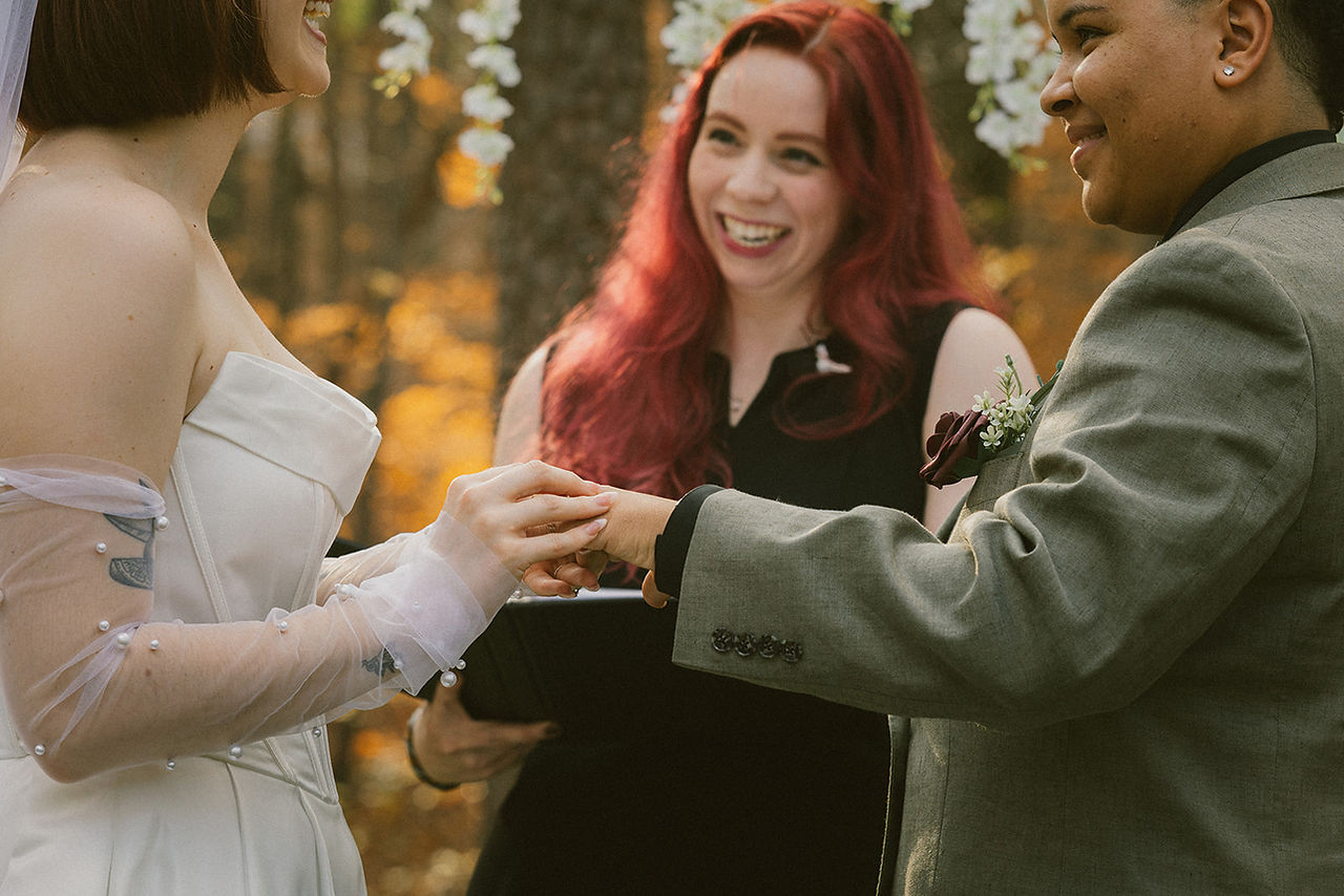 Intimate ,WLW, backyard wedding ,Atlanta, emotional moments, relaxed atmosphere, blend, editorial portraits , documentary-style, storytelling.Two brides ,celebrating ,intimate backyard wedding, candid moments, timeless ,editorial photography, cinematic lighting, editorial portraits, authentic documentary-style moments