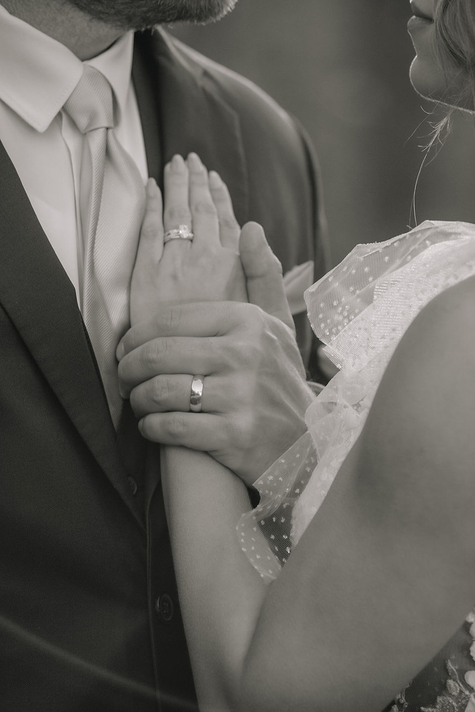 Bride and groom showing off their wedding rings at Juliette Chapel wedding