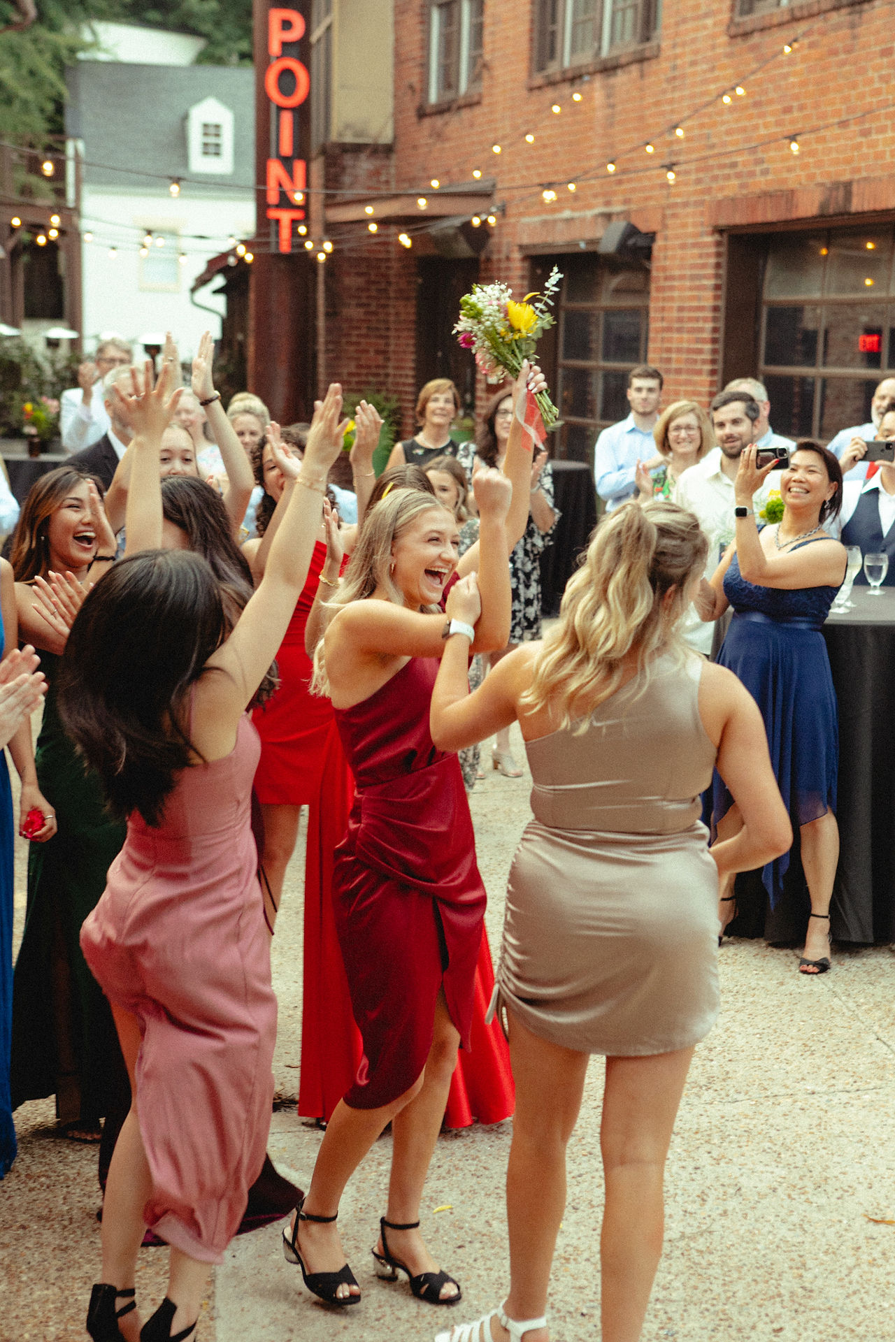 summer wedding photographer bouquet toss colorful timeless vintage film