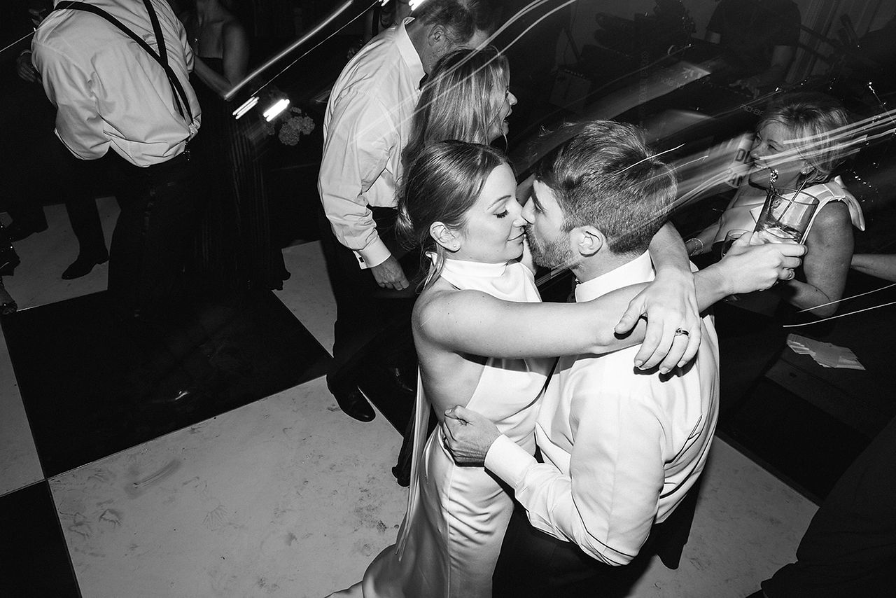 couple walking into wedding reception at Idle Hour in Macon, GA
