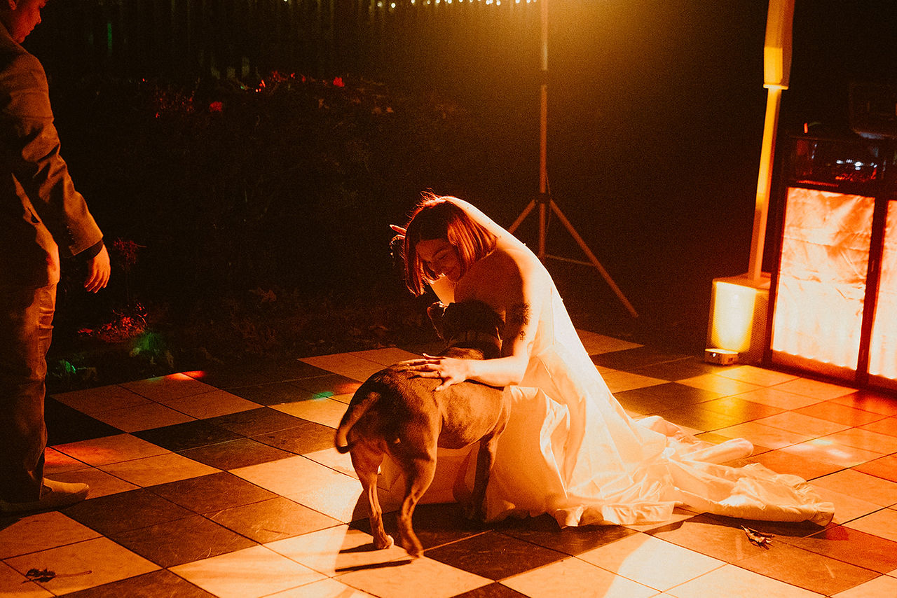 Intimate ,WLW, backyard wedding ,Atlanta, emotional moments, relaxed atmosphere, blend, editorial portraits , documentary-style, storytelling.Two brides ,celebrating ,intimate backyard wedding, candid moments, timeless ,editorial photography, cinematic lighting, editorial portraits, authentic documentary-style moments
