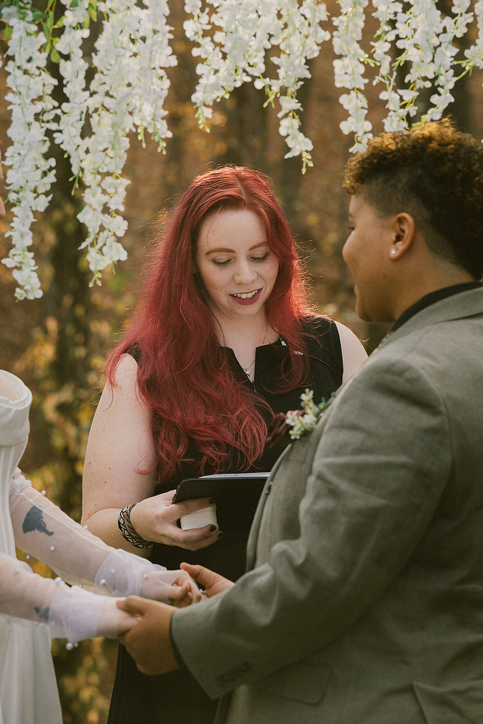 Intimate ,WLW, backyard wedding ,Atlanta, emotional moments, relaxed atmosphere, blend, editorial portraits , documentary-style, storytelling.Two brides ,celebrating ,intimate backyard wedding, candid moments, timeless ,editorial photography, cinematic lighting, editorial portraits, authentic documentary-style moments