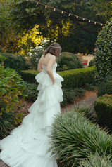 bride first look vintage gown greenery happy walking candid