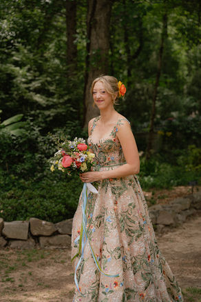 Spring wedding at the State Botanical Garden of Georgia in Athens featuring colorful floral wedding details, a chapel ceremony, romantic garden portraits, and joyful reception moments captured by an Athens wedding photographer
