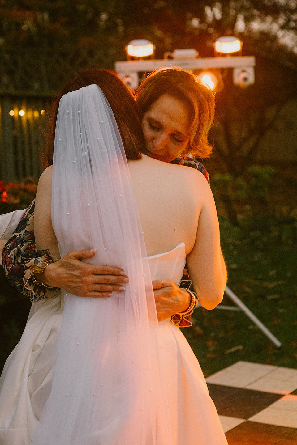 Intimate ,WLW, backyard wedding ,Atlanta, emotional moments, relaxed atmosphere, blend, editorial portraits , documentary-style, storytelling.Two brides ,celebrating ,intimate backyard wedding, candid moments, timeless ,editorial photography, cinematic lighting, editorial portraits, authentic documentary-style moments