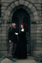 Gothic Oakland Cemetery elopement in Atlanta featuring a romantic mausoleum ceremony, dramatic Victorian-inspired wedding portraits, black roses, cathedral veil, military dress uniform, and timeless alternative wedding photography.