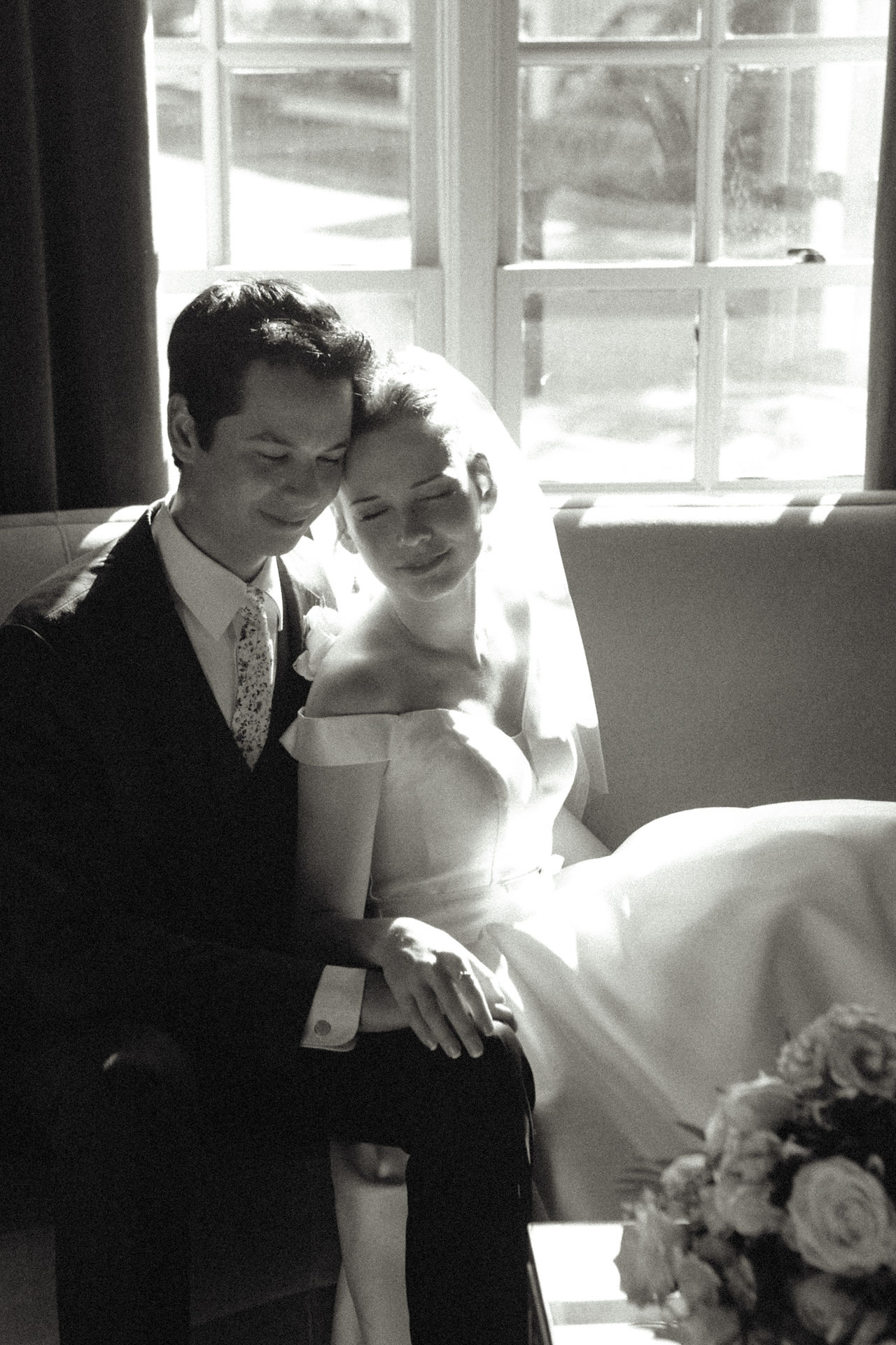 seated pose wedding photo black and white