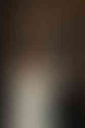 groom laughing during dance happy bride