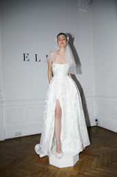 Matilda by Ellis Bridal - Luxury floral jacquard A-Line wedding dress with a strapless pleated bodice, drop waist and dramatic thigh high split and pockets. This dress can also be ordered without the split. Available at Soraya Louise Bridal in Cheadle, Manchester.