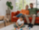 Family in house on sofa.png