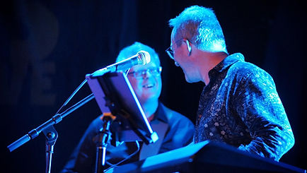 Soul Reason members Chris Pocock and Richard Calverley performing live on stage in Bath