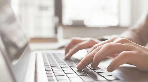 typing on laptop