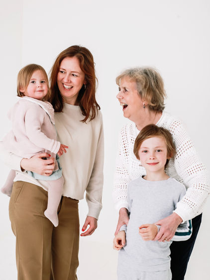 Natural family photography in Greenwich with three generations at The Greenwich Studio