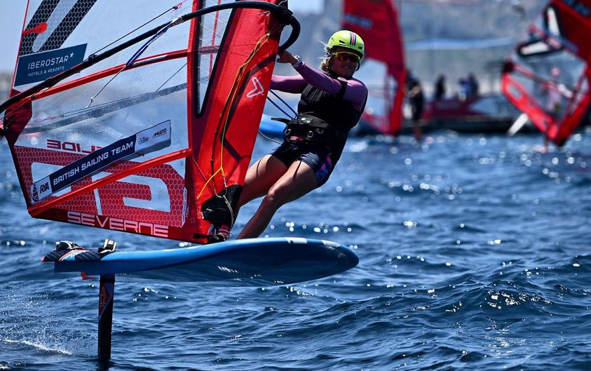 Emma windsurfs